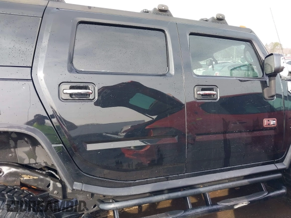 2006 Hummer H2 with VIN 5GRGN23U06H113353, listed as a IAAI auction lot 41476649 with 165,370 mi miles. Bid and sale history available at carsss.com. Image 13.