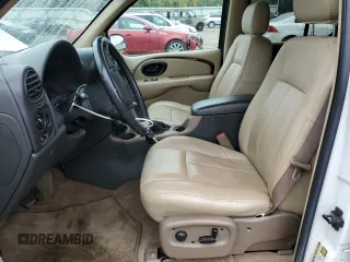 2004 Oldsmobile Bravada z VIN 1GHDT13S342224699, wystawiony jako Copart lot #71546144 z przebiegiem 36 549 mil mil oraz Tytuł czysty. Historia ofert i sprzedaży dostępna na DreamBid. Obrazek 7.