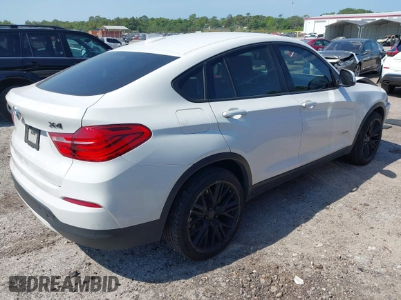 2015 BMW X4 xDrive28i with VIN 5UXXW3C59F0M88331, listed as a IAAI auction lot 42093953 with 138,205 mi miles and . Bid and sale history available at DreamBid. Image 4.