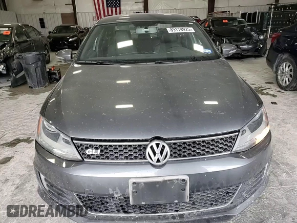 2014 Volkswagen Jetta GLI z VIN 3VW4T7AJ6EM398115, wystawiony jako Copart lot #89179925 z przebiegiem 81 264 mil mil oraz Szkoda całkowita • Salvage title. Historia ofert i sprzedaży dostępna na DreamBid. Obrazek 11.