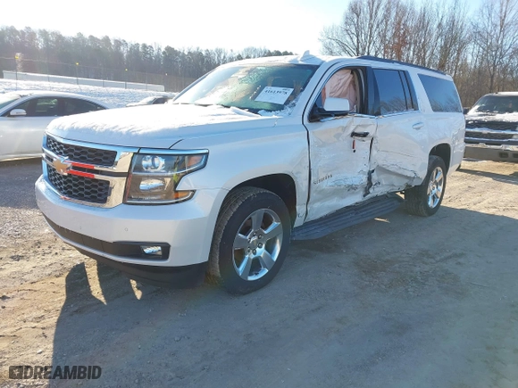 2016 Chevrolet Suburban LT with VIN 1GNSKHKC4GR231747, listed as a IAAI auction lot 41613978 with 80,584 mi miles. Bid and sale history available at carsss.com. Image 17.