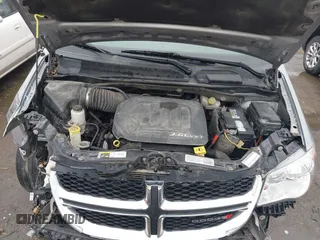 2014 Dodge Grand Caravan American Value with VIN 2C4RDGBG9ER187198, listed as a IAAI auction lot 41669334 with 204,803 mi miles and . Bid and sale history available at DreamBid. Image 10.