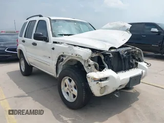 2002 Jeep Liberty Limited z VIN 1J4GL58K32W145911, wystawiony jako IAAI lot #42162631 z przebiegiem 213 446 mil mil oraz . Historia ofert i sprzedaży dostępna na DreamBid. Obrazek 1.