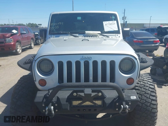 2012 Jeep Wrangler Unlimited Sport with VIN 1C4BJWDG8CL270788, listed as a IAAI auction lot 41758929 with 138,935 mi miles. Bid and sale history available at carsss.com. Image 6.