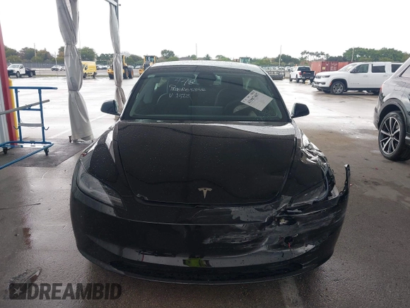 2024 Tesla Model 3 with VIN 5YJ3E1EA6RF731312, listed as a IAAI auction lot 41987407 with 5,025 mi miles and . Bid and sale history available at DreamBid. Image 12.