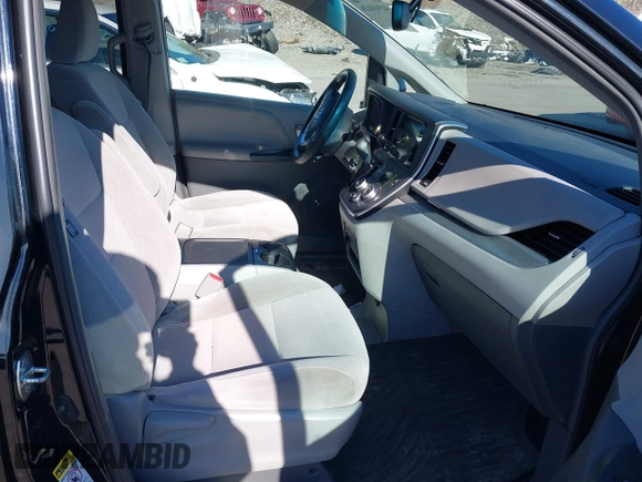 2015 Toyota Sienna LE AAS with VIN 5TDKK3DCXFS594370, listed as a IAAI auction lot 41910126 with 131,638 mi miles. Bid and sale history available at carsss.com. Image 5.