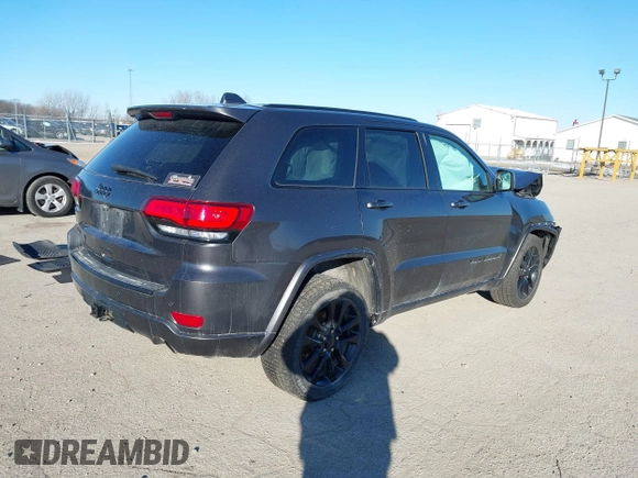 2017 Jeep Grand Cherokee Laredo with VIN 1C4RJFAG7HC769642, listed as a IAAI auction lot 41367874 with 128,095 mi miles. Bid and sale history available at carsss.com. Image 4.