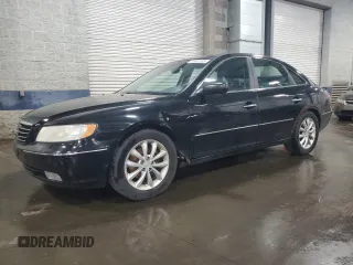 2006 Hyundai Azera SE z VIN KMHFC46F46A134139, wystawiony jako Copart lot #61850305 z przebiegiem 226 748 mil mil oraz Czysty tytuł • Clean title. Historia ofert i sprzedaży dostępna na DreamBid. Obrazek 1.
