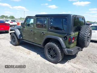 2024 Jeep Wrangler Willys with VIN 1C4PJXDG8RW236725, listed as a IAAI auction lot 39128397 with 50 mi miles and . Bid and sale history available at DreamBid. Image 3.