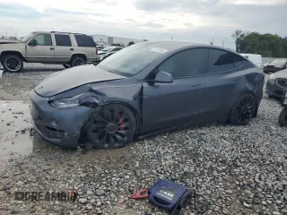2022 Tesla Model Y Performance with VIN 7SAYGDEF0NF497582, listed as a Copart auction lot 65131685 with 50,948 mi miles and Clean title. Bid and sale history available at DreamBid. Image 1.