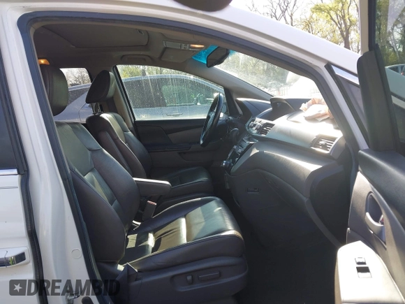 2012 Honda Odyssey EX-L with VIN 5FNRL5H62CB010054, listed as a IAAI auction lot 42040117 with 189,566 mi miles and . Bid and sale history available at carsss.com. Image 5.
