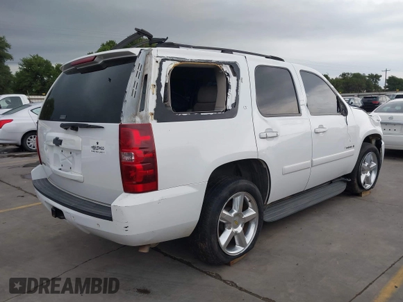 2007 Chevrolet Tahoe LS with VIN 1GNFC13J97R281157, listed as a IAAI auction lot 42167329 with Not provided miles and . Bid and sale history available at DreamBid. Image 4.