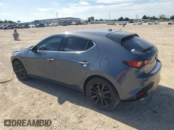 2023 Mazda 3 2.5 Turbo with VIN JM1BPBJY6P1618707, listed as a Copart auction lot 64999854 with 1,671 mi miles and Salvage title. Bid and sale history available at DreamBid. Image 2.