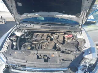 2014 Ford Taurus Limited with VIN 1FAHP2F8XEG133523, listed as a IAAI auction lot 40285220 with 134,939 mi miles. Bid and sale history available at carsss.com. Image 10.