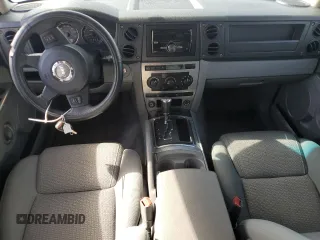 2006 Jeep Commander with VIN 1J8HH48K96C289162, listed as a Copart auction lot 80979074 with 170,581 mi miles and Salvage title. Bid and sale history available at DreamBid. Image 8.
