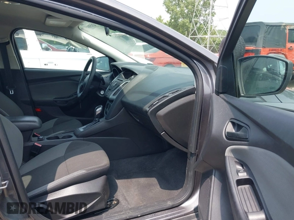 2012 Ford Focus SE with VIN 1FAHP3F26CL186645, listed as a IAAI auction lot 42458819 with 99,470 mi miles and . Bid and sale history available at DreamBid. Image 5.