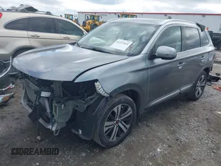 2017 Mitsubishi Outlander SE with VIN JA4AD3A35HZ057699, listed as a IAAI auction lot 42337414 with 85,950 mi miles and . Bid and sale history available at DreamBid. Image 2.