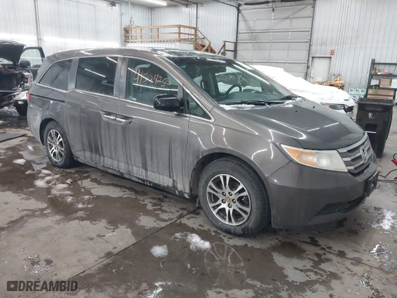 2012 Honda Odyssey EX-L with VIN 5FNRL5H66CB101151, listed as a IAAI auction lot 41504250 with 261,836 mi miles. Bid and sale history available at carsss.com. Image 1.