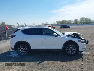 2018 Mazda CX-5 Grand Touring with VIN JM3KFBDM0J0404635, listed as a IAAI auction lot 41883068 with 71,178 mi miles. Bid and sale history available at carsss.com. Image 13.