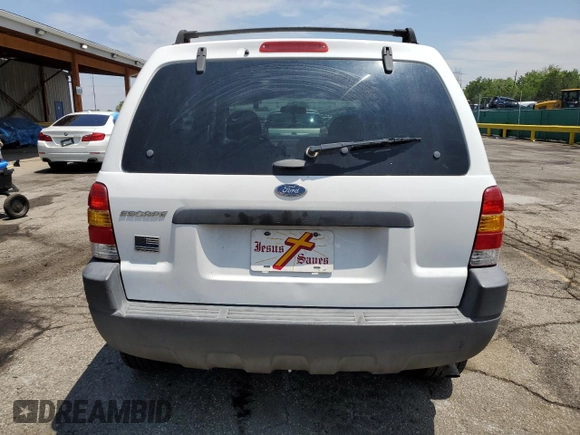 2004 Ford Escape XLS with VIN 1FMCU92114DA15564, listed as a Copart auction lot 59358015 with 186,135 mi miles and Salvage title. Bid and sale history available at DreamBid. Image 6.