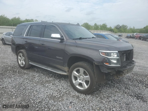 2015 Chevrolet Tahoe LTZ with VIN 1GNSCCKC8FR628330, listed as a Copart auction lot 54561835 with 212,503 mi miles and Salvage Title. Bid and sale history available at carsss.com. Image 4.