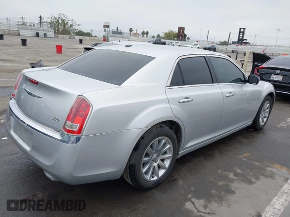 2012 Chrysler 300 Limited with VIN 2C3CCACG6CH309558, listed as a IAAI auction lot 42499372 with 145,414 mi miles and . Bid and sale history available at DreamBid. Image 4.
