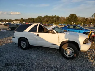 2001 GMC Jimmy SLS Comfort/Convenience with VIN 1GKCT18W31K181320, listed as a Copart auction lot 73676454 with 135,419 mi miles and Salvage Title. Bid and sale history available at carsss.com. Image 4.