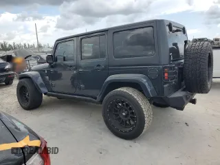 2016 Jeep Wrangler Unlimited Sahara with VIN 1C4HJWEG8GL275844, listed as a Copart auction lot 58997665 with 71,583 mi miles and Salvage title. Bid and sale history available at DreamBid. Image 2.