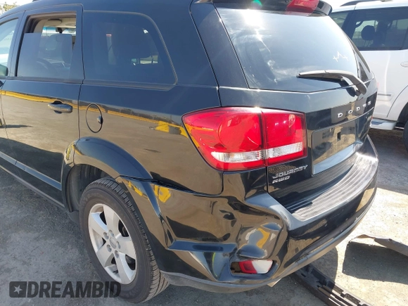 2012 Dodge Journey SXT with VIN 3C4PDDBG0CT300469, listed as a IAAI auction lot 42467233 with 127,420 mi miles and . Bid and sale history available at DreamBid. Image 13.