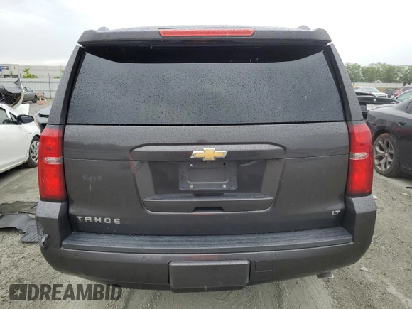 2015 Chevrolet Tahoe LT with VIN 1GNSCBKC9FR118286, listed as a Copart auction lot 56168375 with 144,824 mi miles and Salvage title. Bid and sale history available at DreamBid. Image 6.