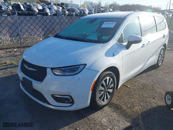 2023 Chrysler Pacifica Hybrid Touring L with VIN 2C4RC1L74PR562240, listed as a IAAI auction lot 42060669 with 45,882 mi miles. Bid and sale history available at carsss.com. Image 2.