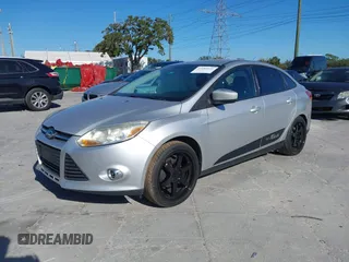 2012 Ford Focus SE with VIN 1FAHP3F23CL265724, listed as a IAAI auction lot 41184121 with 216,873 mi miles. Bid and sale history available at carsss.com. Image 17.