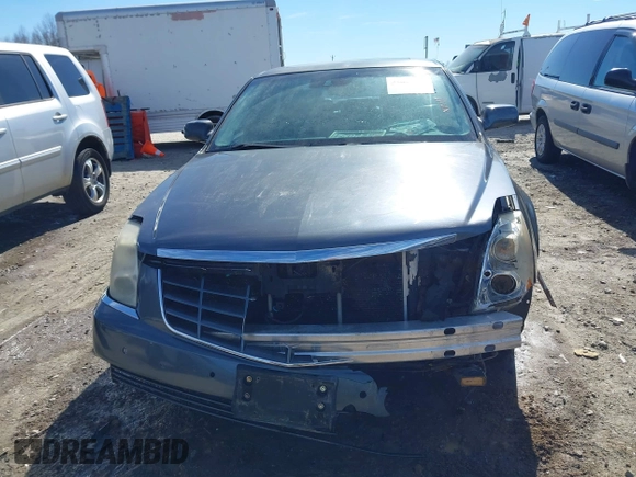 2011 Cadillac DTS Premium Collection z VIN 1G6KH5E68BU124852, wystawiony jako IAAI lot #41652793 z przebiegiem 227 148 mil mil oraz . Historia ofert i sprzedaży dostępna na DreamBid. Obrazek 13.