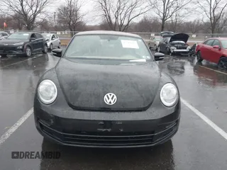 2013 Volkswagen Beetle 2.5L with VIN 3VW5P7AT8DM832656, listed as a IAAI auction lot 41729356 with 124,156 mi miles and . Bid and sale history available at DreamBid. Image 11.