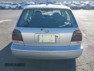 1999 Volkswagen Golf z VIN 3VWJA81HXXM215507, wystawiony jako IAAI lot #41391464 z przebiegiem 167 875 mil mil oraz . Historia ofert i sprzedaży dostępna na DreamBid. Obrazek 16.