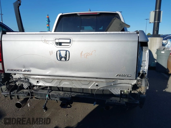 2022 Honda Ridgeline RTL-E with VIN 5FPYK3F78NB016045, listed as a IAAI auction lot 41626864 with 57,130 mi miles and . Bid and sale history available at DreamBid. Image 17.