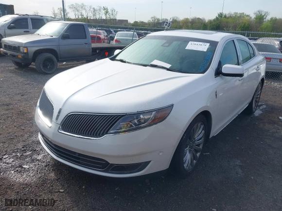 2013 Lincoln MKS with VIN 1LNHL9DK4DG611684, listed as a IAAI auction lot 42043879 with 132,866 mi miles. Bid and sale history available at carsss.com. Image 2.