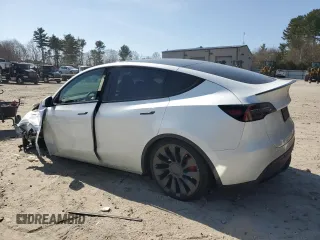2021 Tesla Model Y Performance with VIN 5YJYGDEF9MF268006, listed as a Copart auction lot 49082695 with 69,743 mi miles and Salvage Title. Bid and sale history available at DreamBid. Image 2.