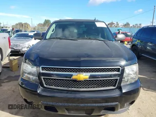 2014 Chevrolet Suburban LT with VIN 1GNSCJE08ER240230, listed as a IAAI auction lot 41702593 with 140,190 mi miles. Bid and sale history available at carsss.com. Image 12.