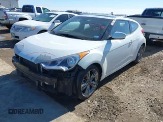 2016 Hyundai Veloster z VIN KMHTC6AD3GU267365, wystawiony jako IAAI lot #41469796 z przebiegiem 111 791 mil mil oraz . Historia ofert i sprzedaży dostępna na DreamBid. Obrazek 18.