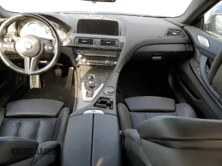 2017 BMW M6 z VIN WBS6E9C52HG437288, wystawiony jako Copart lot #38576804 z przebiegiem 25 137 mil mil oraz Tytuł czysty. Historia ofert i sprzedaży dostępna na DreamBid. Obrazek 8.