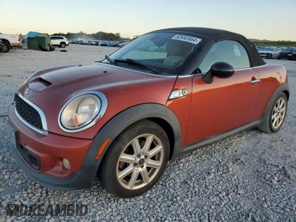 2013 MINI Roadster S z VIN WMWSY3C55DT594614, wystawiony jako Copart lot #87357464 z przebiegiem 119 449 mil mil oraz Tytuł czysty. Historia ofert i sprzedaży dostępna na DreamBid. Obrazek 1.