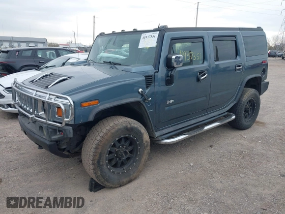 2005 Hummer H2 SUV z VIN 5GRGN23U95H100888, wystawiony jako IAAI lot #41937351 z przebiegiem 202 969 mil mil oraz . Historia ofert i sprzedaży dostępna na DreamBid. Obrazek 18.
