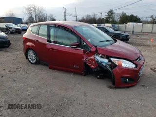 2016 Ford C-Max Energi SEL with VIN 1FADP5CU8GL119986, listed as a Copart auction lot 82677273 with 64,021 mi miles. Bid and sale history available at carsss.com. Image 4.