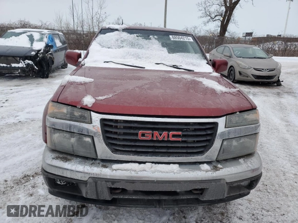 2010 GMC Canyon z VIN 1GTKTFDE5A8123398, wystawiony jako Copart lot #88504215 z przebiegiem 199 472 mil mil oraz Szkoda całkowita • Salvage title. Historia ofert i sprzedaży dostępna na DreamBid. Obrazek 5.