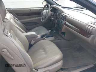2002 Chrysler Sebring LXi with VIN 1C3EL55RX2N323080, listed as a IAAI auction lot 42021237 with 131,151 mi miles and . Bid and sale history available at DreamBid. Image 5.