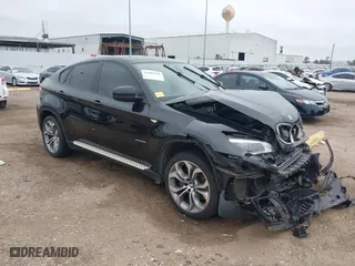 2014 BMW X6 50i with VIN 5UXFG8C51EL592556, listed as a IAAI auction lot 41604940 with 88,310 mi miles. Bid and sale history available at carsss.com. Image 1.