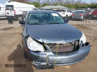 2008 Chrysler Sebring LX with VIN 1C3LC46K38N156346, listed as a IAAI auction lot 40965609 with 0 mi miles. Bid and sale history available at carsss.com. Image 1.