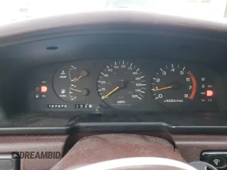 1990 Nissan Maxima z VIN JN1HJ01P3LT393901, wystawiony jako Copart lot #79912694 z przebiegiem 127 678 mil mil oraz Szkody całkowita. Historia ofert i sprzedaży dostępna na DreamBid. Obrazek 9.