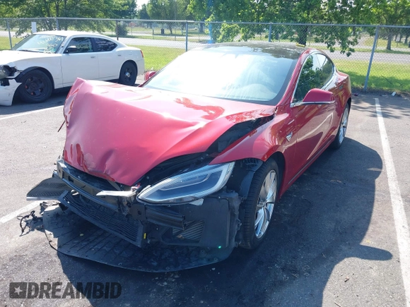 2016 Tesla Model S 90D z VIN 5YJSA1E4XGF171244, wystawiony jako IAAI lot #42584589 z przebiegiem 85 412 mil mil oraz . Historia ofert i sprzedaży dostępna na DreamBid. Obrazek 17.
